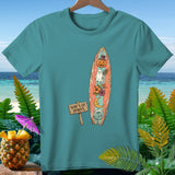 Turquoise t-shirt with a surfboard graphic featuring a pumpkin, ghost, and moon.