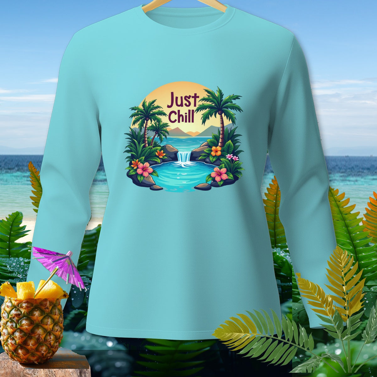 Light blue long-sleeve shirt with "Just Chill" tropical waterfall graphic.
