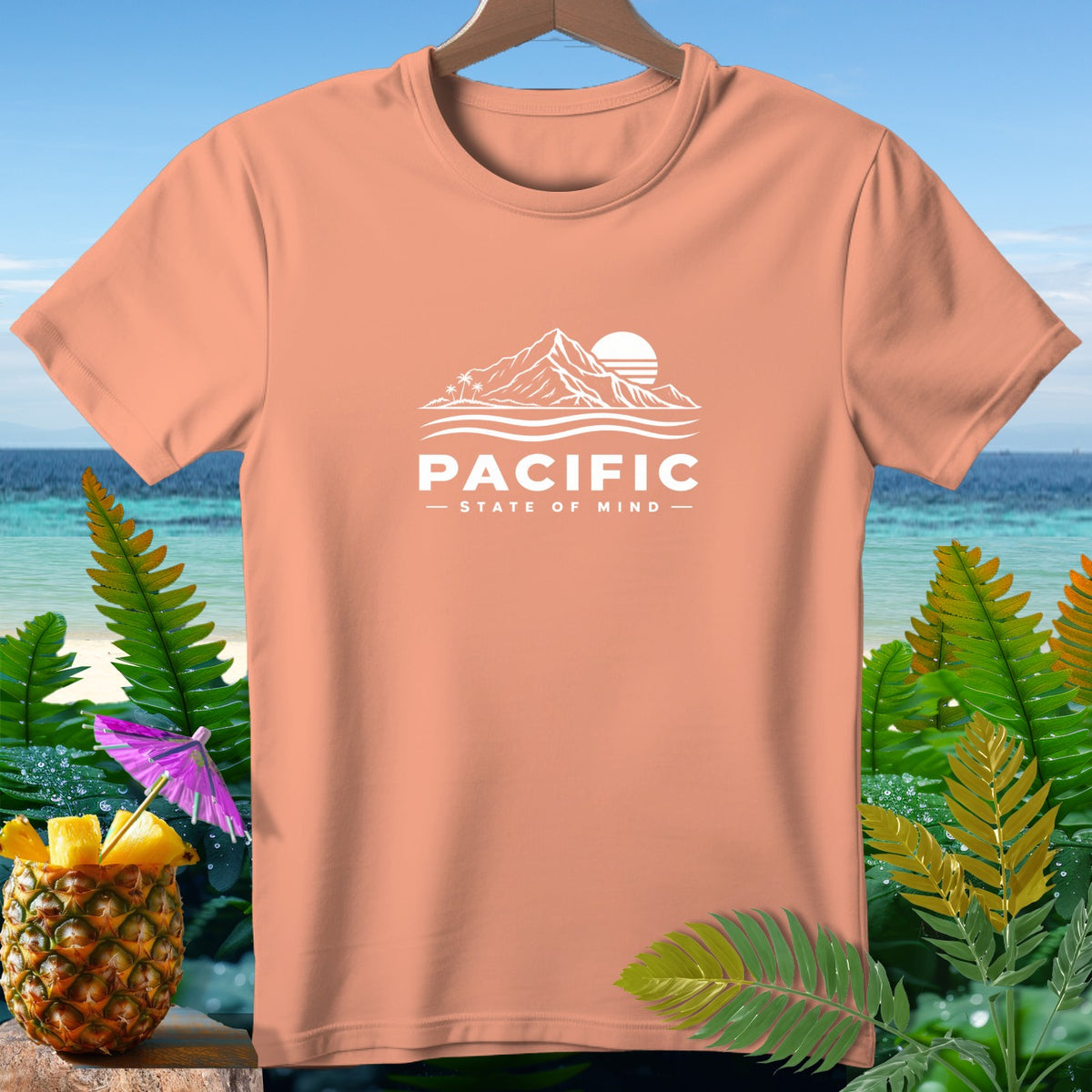 Peach t-shirt with white "PACIFIC STATE OF MIND" graphic.